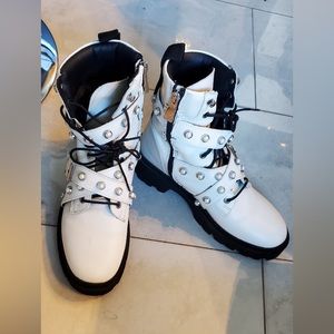 White leather combat boots with pearl accents